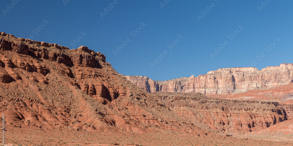 Fototapeta premium Glen Canyon bluffs under a blue sky