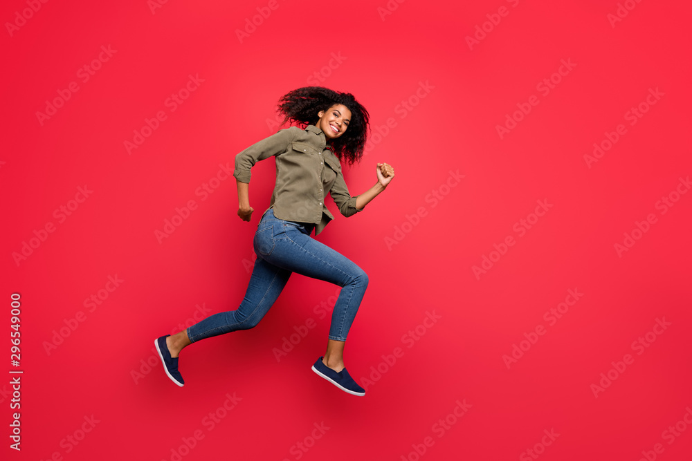 Full length body size side profile photo of cheerful positive casual nice girlfriend running to have sales in shopping center isolated in shirt jeans denim vibrant color background Full length body size side profile photo of cheerful positive casual nice girlfriend running to have sales in shopping center isolated in shirt jeans denim vibrant color background