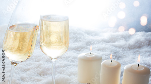 Candles and champagne in winter