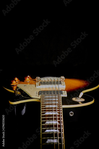 les paul isolated on black background, blackout, place for text