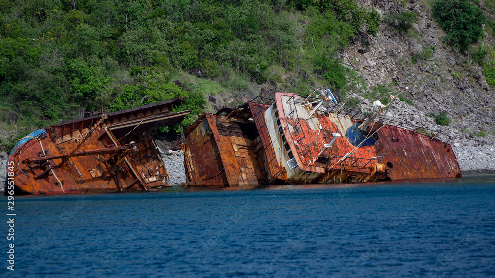 Rusty ship wreck on coast line