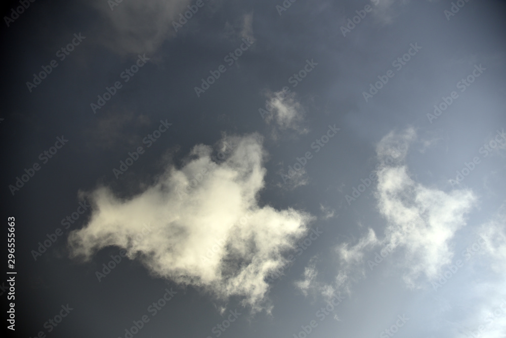 Obraz premium white clouds on black background.