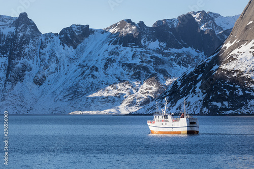 Fishing boat on Lofoten islands in winter photo