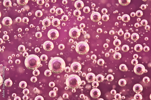 Small and Large Oxygen Bubbles in Pomegranate Liquid