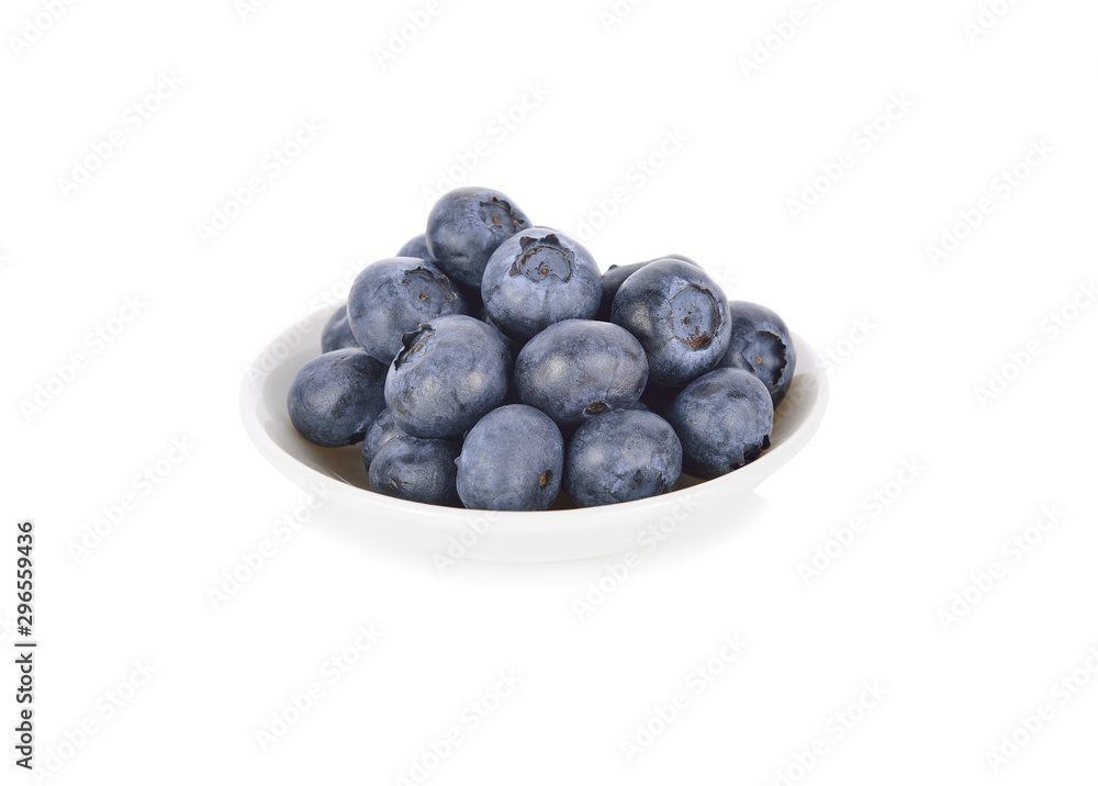 whole fresh blueberries in small bowl on white background whole fresh blueberries in small bowl on white background