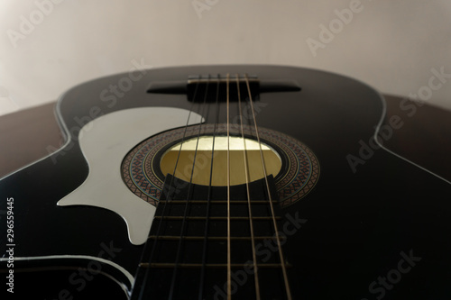 Black classic guitar in perspective photo