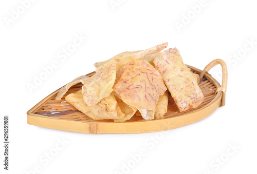 fried crispy taro chips in bamboo plate with white background