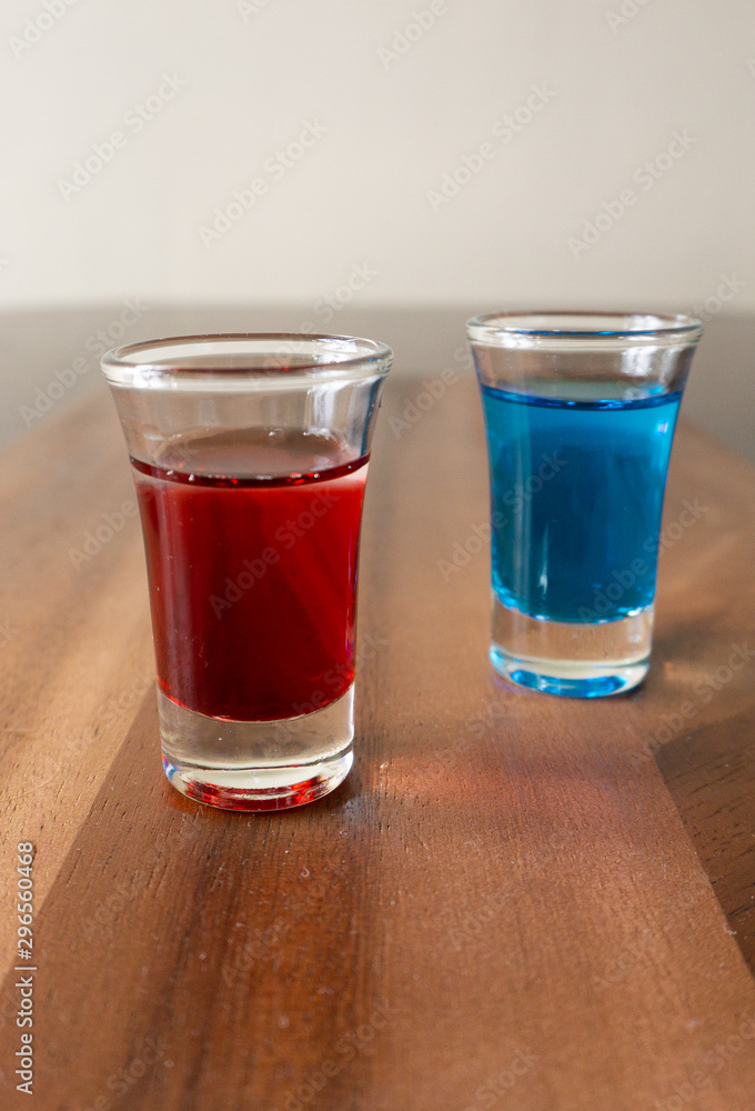 shots of Blue Curacao and Grenadine shots of Blue Curacao and Grenadine