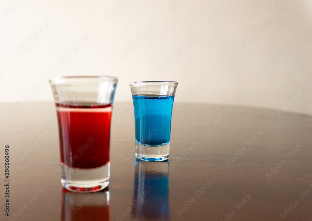shots of Blue Curacao and Grenadine shots of Blue Curacao and Grenadine