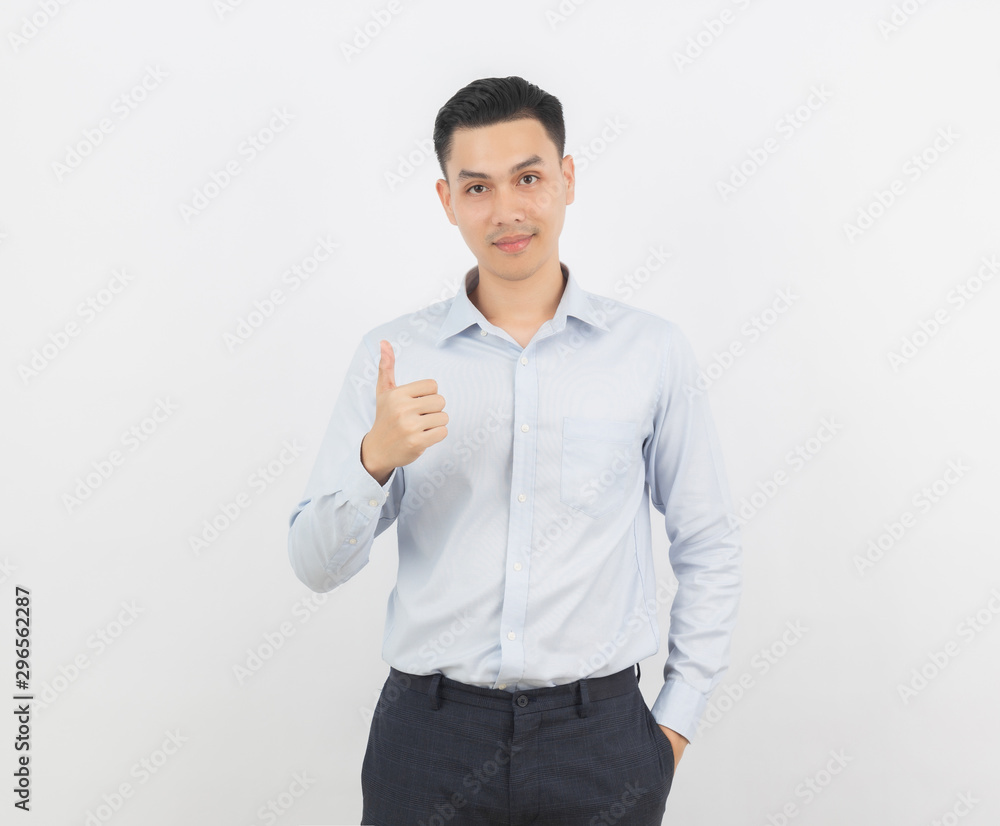 Young handsome asian business man smiling and showing thumbs up isolated on white background. Young handsome asian business man smiling and showing thumbs up isolated on white background.