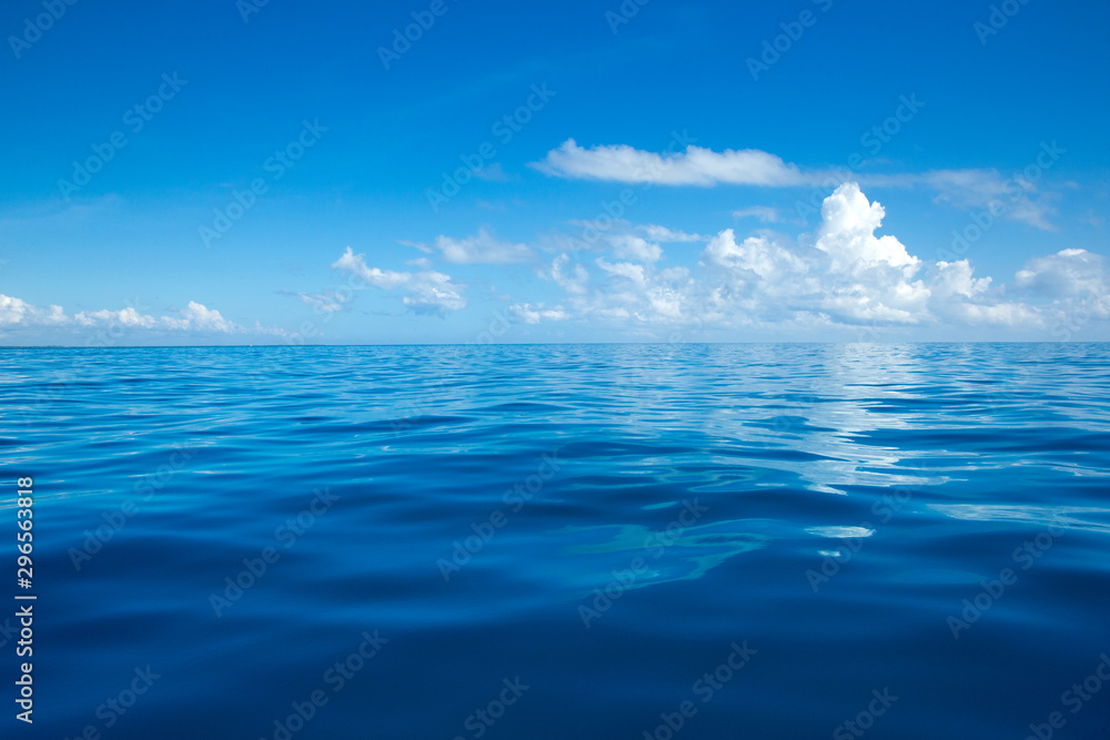 sea surface summer wave background. water landscape with clouds on horizon. Natural tropical water paradise.  Travel tropical