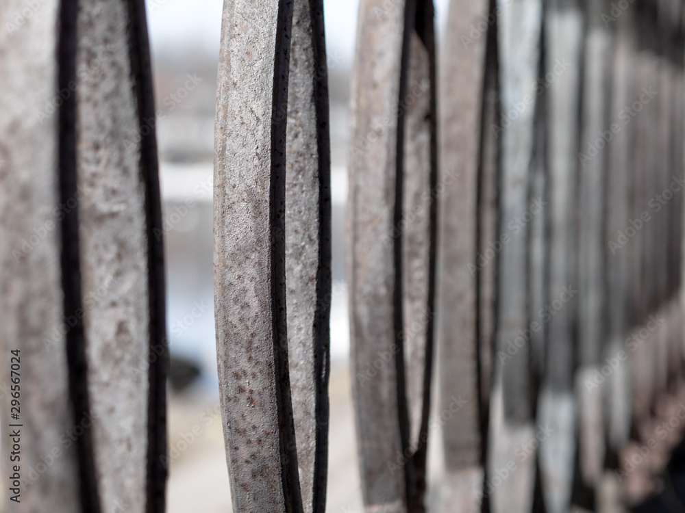 Geometric circles of a metal fence in perspective. close-up. Geometric circles of a metal fence in perspective. close-up.