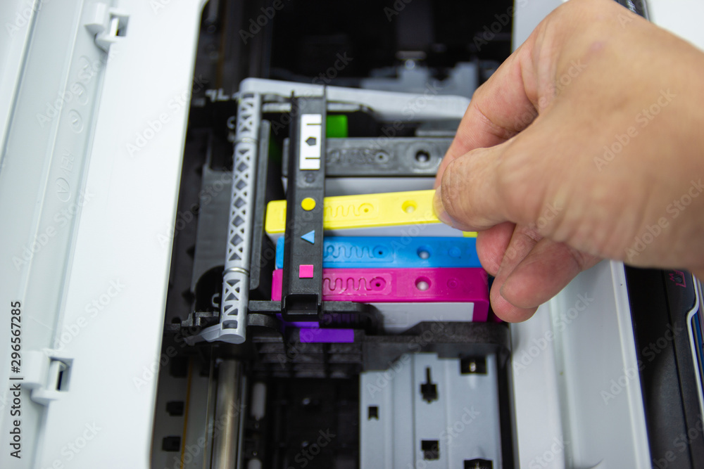 Technicians are install setup the ink cartridge or inkjet cartridge is