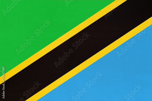 Republic Tanzania national fabric flag textile background. Symbol of world african country.