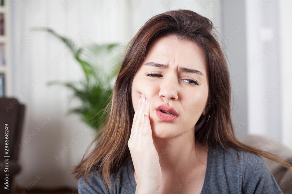 young woman have toothache , painful face young woman have toothache , painful face