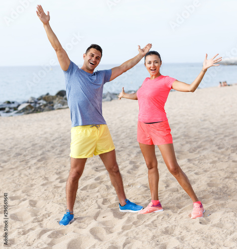 Sporty couple posing after outdoors workout