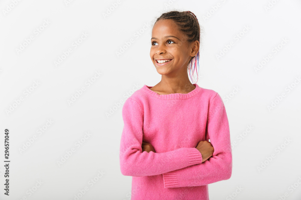 Image of african american joyful girl looking aside with hands crossed Image of african american joyful girl looking aside with hands crossed