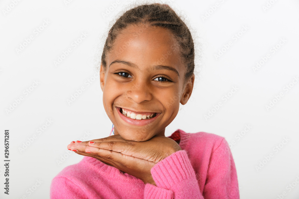 Image of funny african american girl laughing and looking at camera Image of funny african american girl laughing and looking at camera