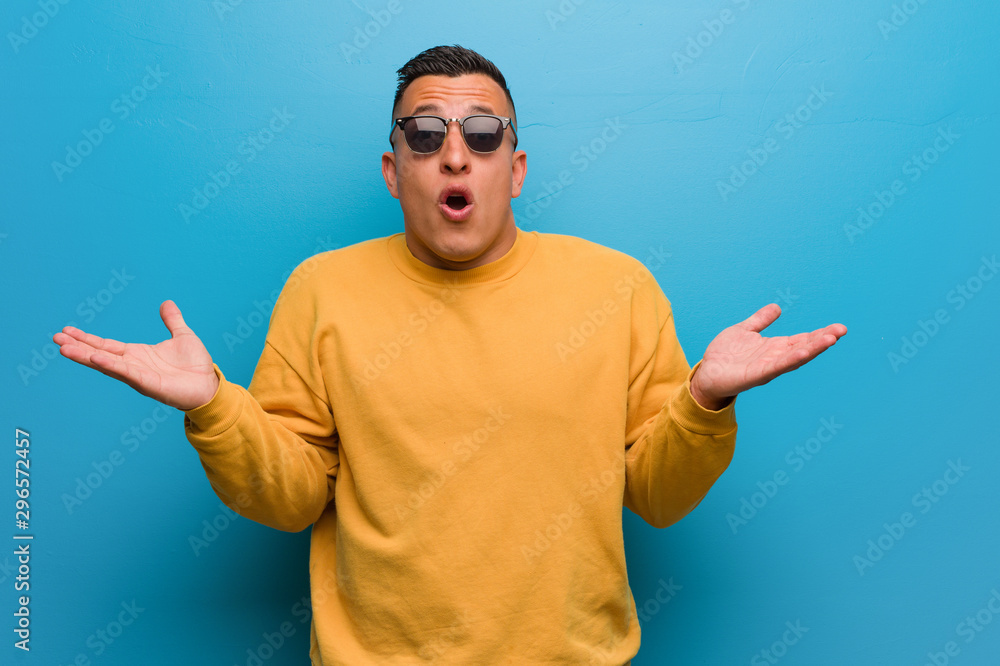 Young colombian man surprised and shocked Young colombian man surprised and shocked