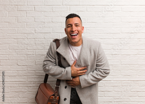Canvastavla Young latin business man laughing and having fun