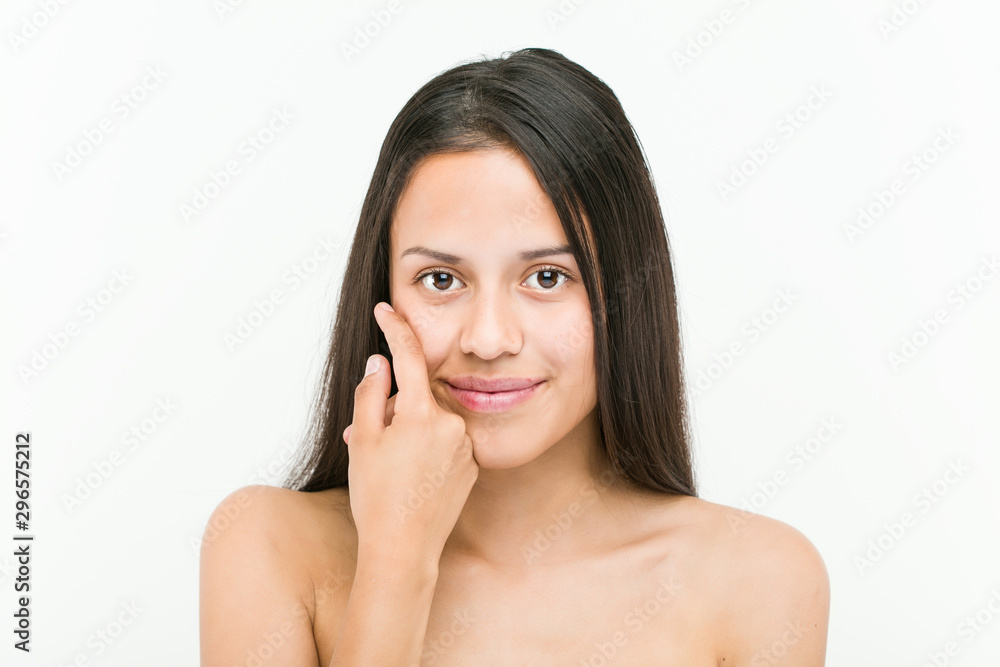 Close up of a beautiful and natural hispanic young woman