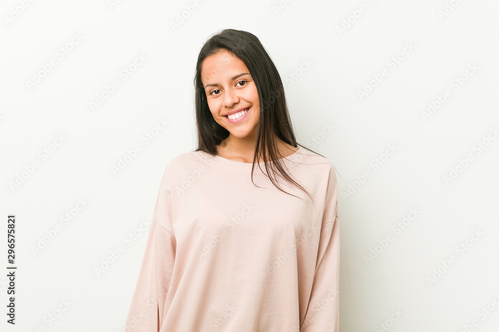 Young cute hispanic teenager woman happy, smiling and cheerful. Young cute hispanic teenager woman happy, smiling and cheerful.
