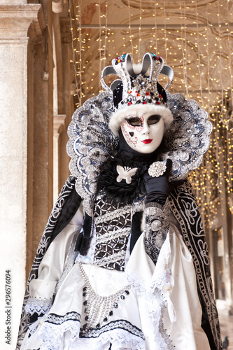 Female carnival mask in Piazza San Marco in Venice during the carnival. Italy