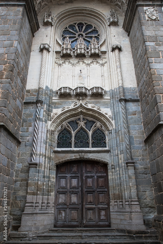 Arched doorway design of old church in La Mayenne region of France