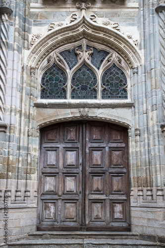 Arched doorway design of old church in La Mayenne region of France