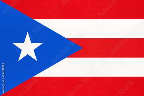 Puerto Rico national fabric flag, textile background. Caribbean state official sign.