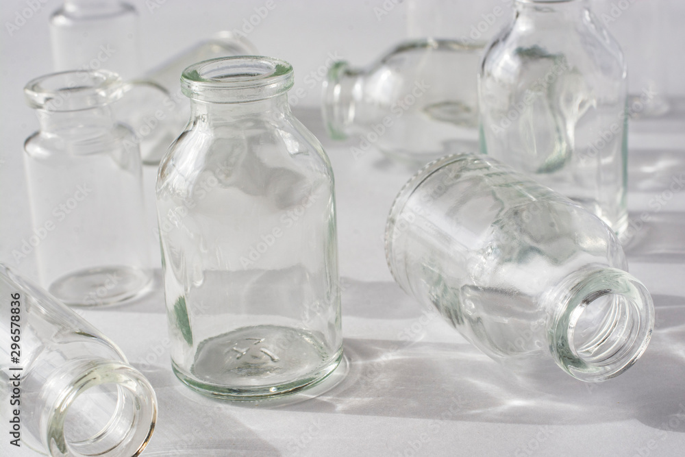 Empty glass medical vials closeup. Empty glass medical vials closeup.