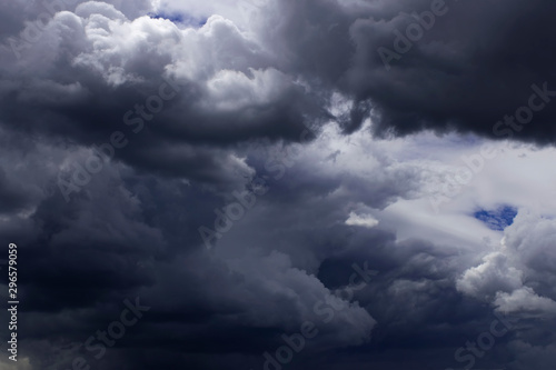 Valokuva Dark sky, white fluffy and rainy dark clouds before rain.