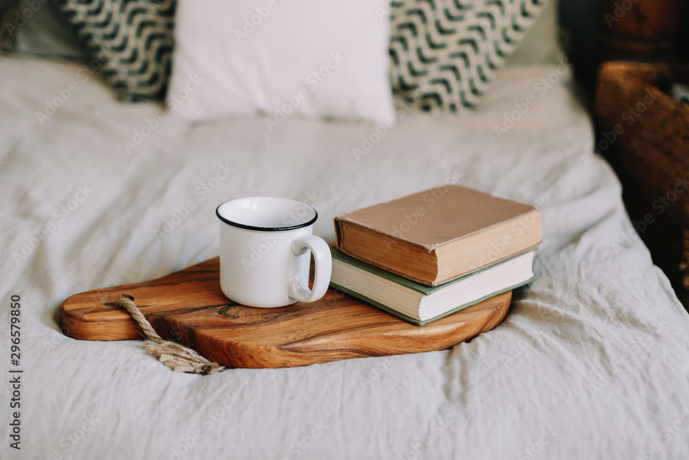 Books and coffee cup. Breakfast in bed. Good morning. Atmospheric hygge style. flat lay, still life Books and coffee cup. Breakfast in bed. Good morning. Atmospheric hygge style. flat lay, still life