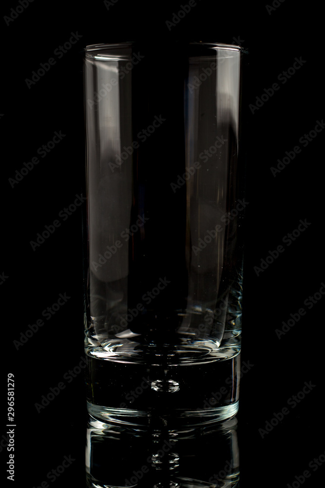 A glass of beer in a black scene A glass of beer in a black scene