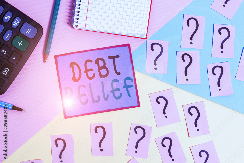 Handwriting text Debt Relief. Conceptual photo partial or total remission of it especially those by countries Mathematics stuff and writing equipment above pastel colours background Handwriting text Debt Relief. Conceptual photo partial or total remission of it especially those by countries Mathematics stuff and writing equipment above pastel colours background