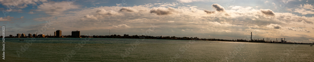 Port Huron Michigan in Panoramic format wide angle to show the industrial skyline. Nice autumn day