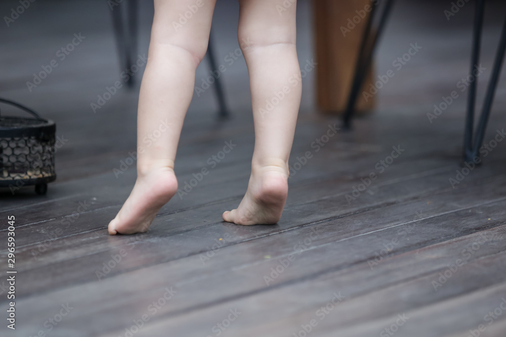 A child walking on tiptoes, Your child is toe walking close up image A child walking on tiptoes, Your child is toe walking close up image
