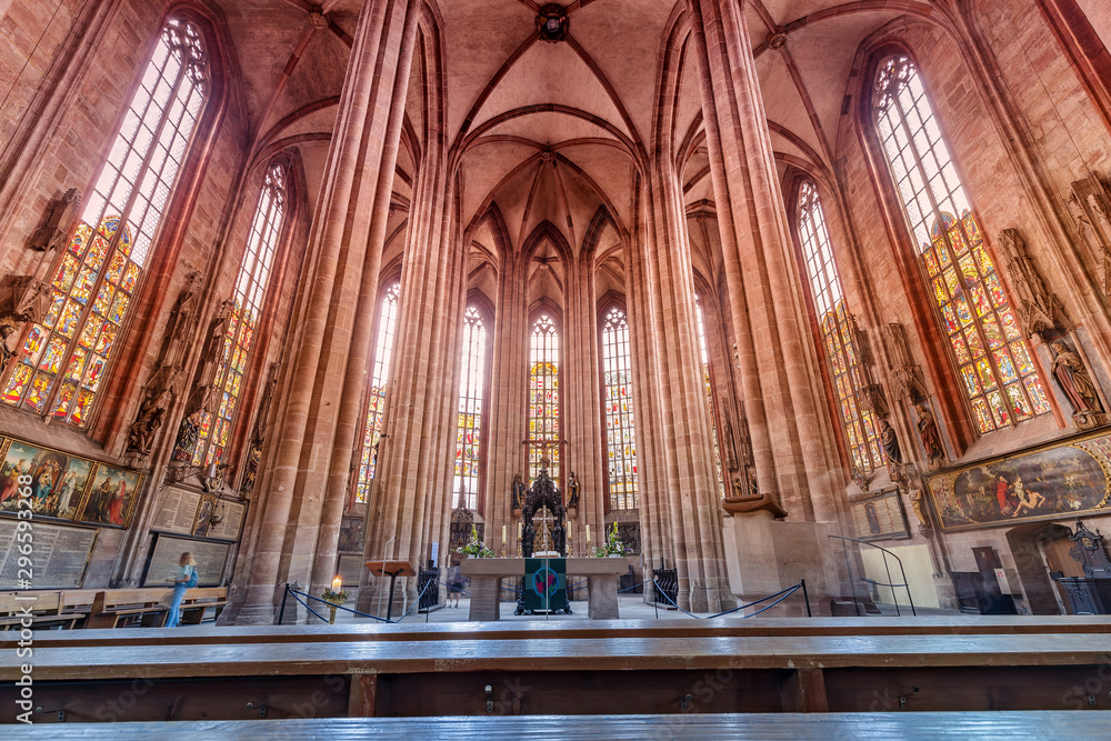 05 August 2019, Nuremberg, Germany: Interior of Saint Sebaldus church in Nuremberg with stained glass