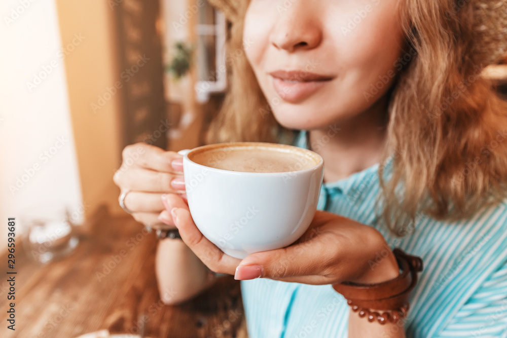 Portrait of beautiful asian woman drinking coffee in retro cafe near window Portrait of beautiful asian woman drinking coffee in retro cafe near window