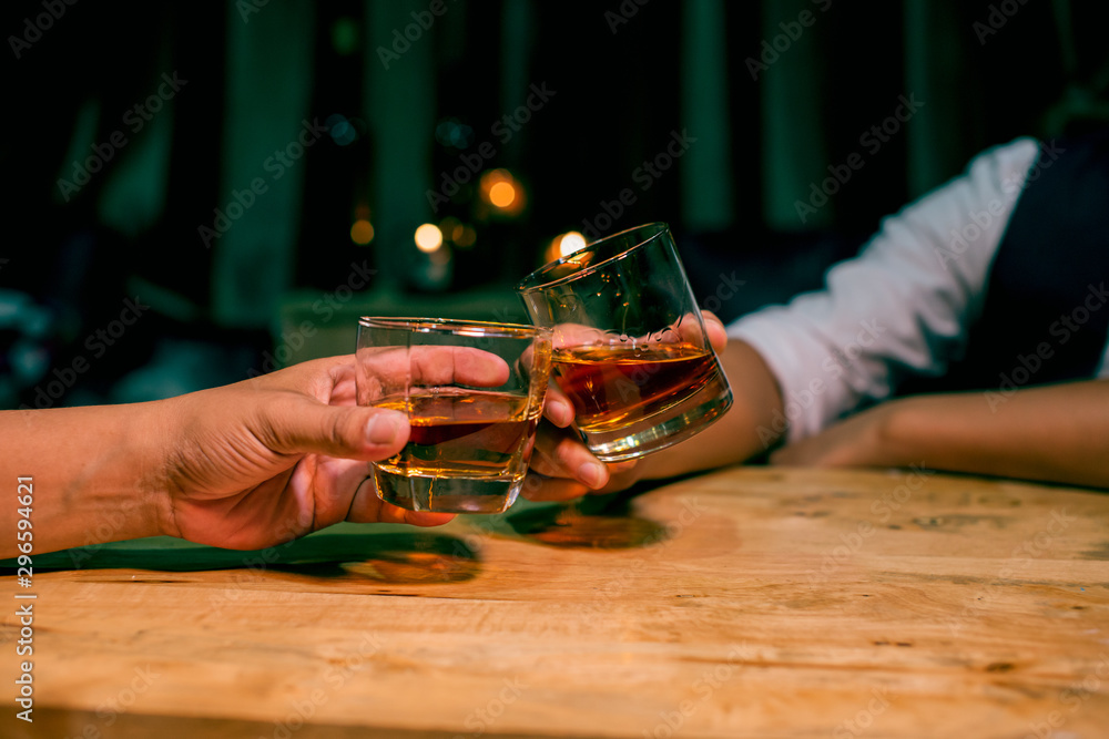 man with glass of red wine