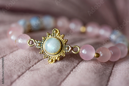 Beautiful mineral stone bracelet on pink velvet