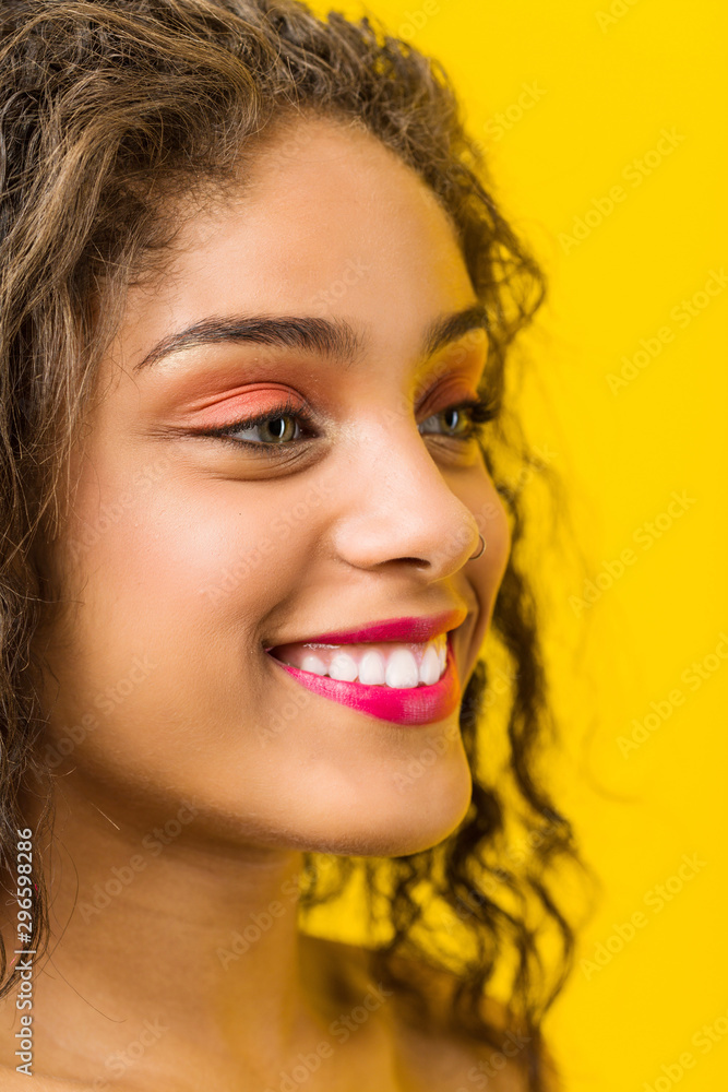 Close up of a young african american beautiful and make-up woman posing Close up of a young african american beautiful and make-up woman posing