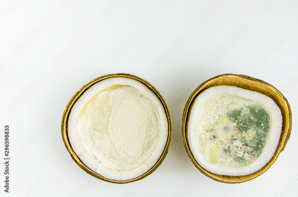 ugly food. old split coconut on a white background ugly food. old split coconut on a white background