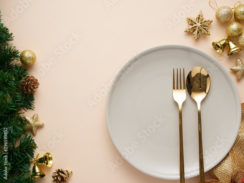 Christmas dinner table setting with gold decorations