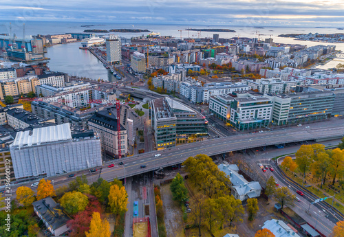 Aerial view of Helsinki city at sunset. Sky and colorful buildings. 