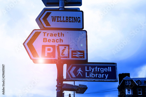 Conceptual hand writing showing Wellbeing. Concept meaning A good or satisfactory condition of existence including health Advertisement concept with empty copy space on the road sign