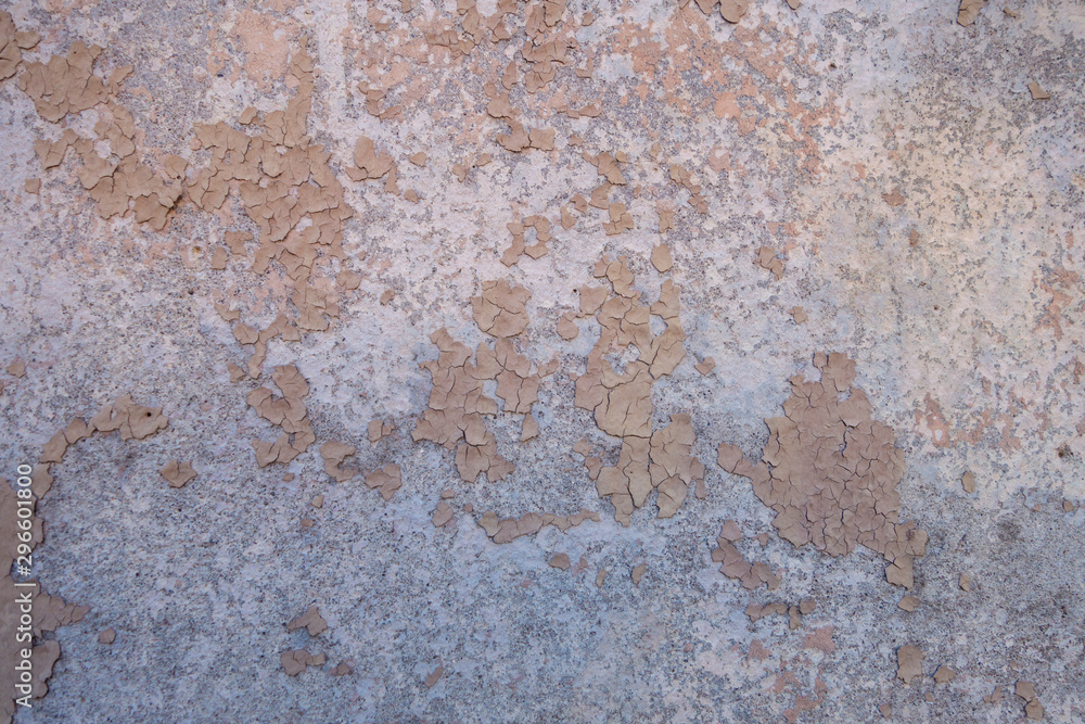 Weathered and chipping outdoor painted cement wall
