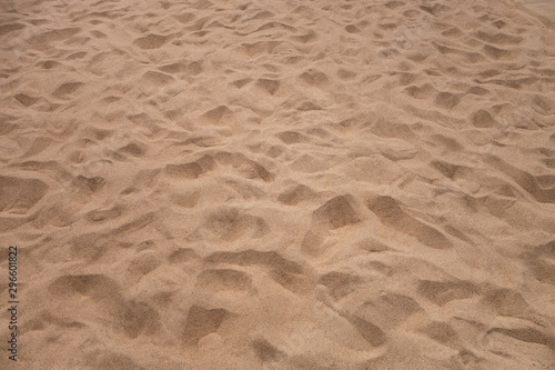 closeup of sand pattern of a beach in the summer © Mirror-images