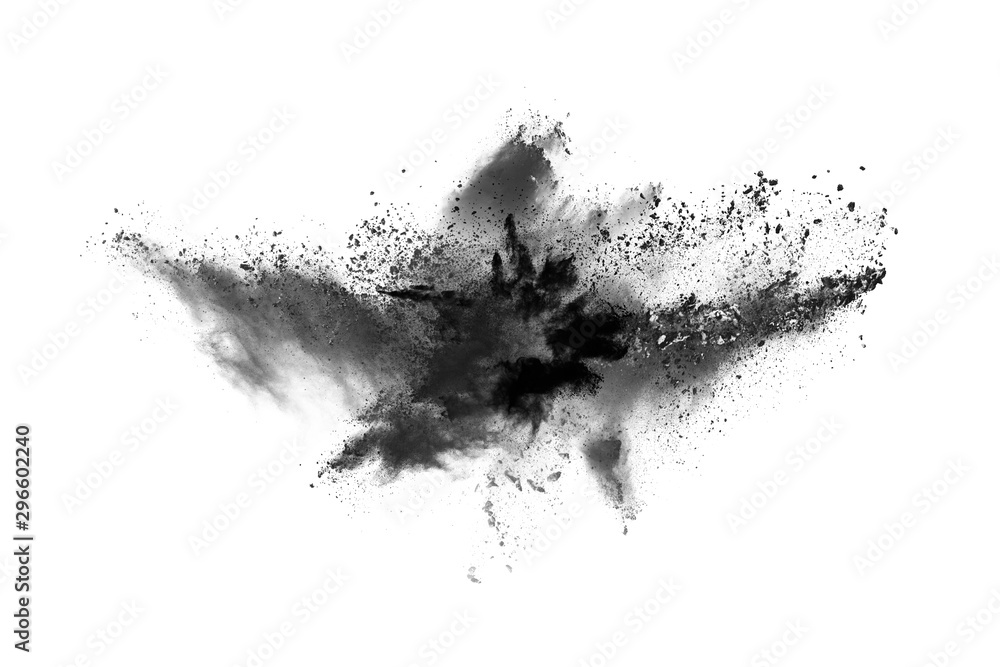 Closeup of black dust particles explode isolated on white background.. Closeup of black dust particles explode isolated on white background..