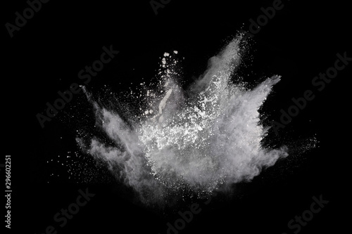 Fototapeta Naklejka Na Ścianę i Meble -  White powder explosion on black background. Colored cloud. Colorful dust explode. Paint Holi.